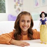 Disney Princess Snow White Fashion Doll, Sparkling Look with Black Hair, Brown Eyes & Hair Accessory